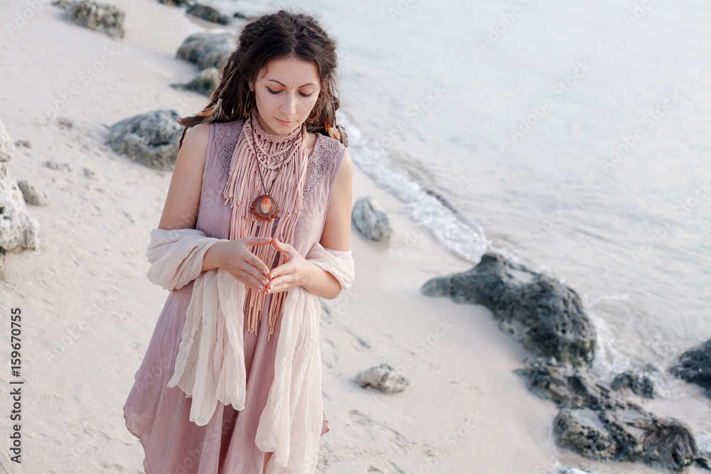 attractive young woman on beach. calm and peaceful attractive young woman on beach. calm and peaceful