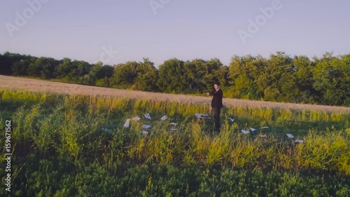 Wallpaper Mural In front of questions. Young businessman in the middle of the nature Torontodigital.ca