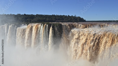 The Iguazu Falls, Iguazú Falls, Iguassu Falls, or Iguaçu Falls, on the Iguazu River on the border of the Argentine province of Misiones and the Brazilian state of Paraná. 