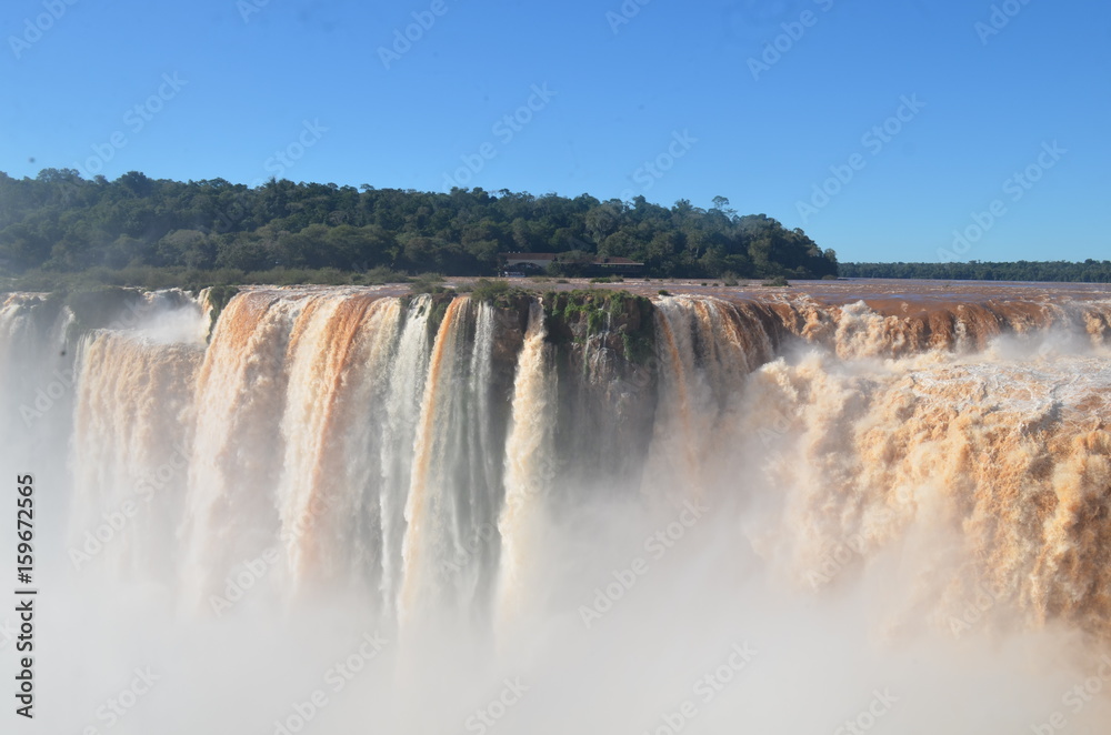 The Iguazu Falls, Iguazú Falls, Iguassu Falls, or Iguaçu Falls, on the Iguazu River on the border of the Argentine province of Misiones and the Brazilian state of Paraná. The Iguazu Falls, Iguazú Falls, Iguassu Falls, or Iguaçu Falls, on the Iguazu River on the border of the Argentine province of Misiones and the Brazilian state of Paraná.