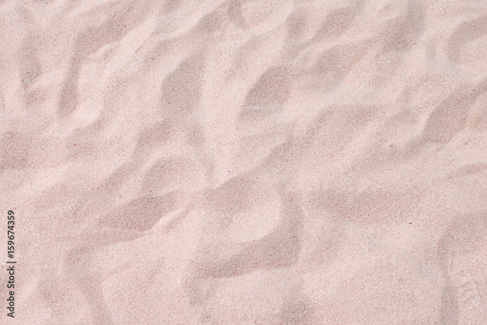 Naklejka premium closeup of sand pattern of a beach in the summer