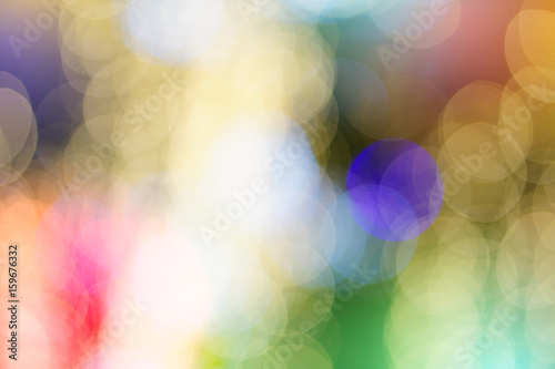 Beautiful colorful blurred lights background during greeting season, Christmas and New Year Festive Background.