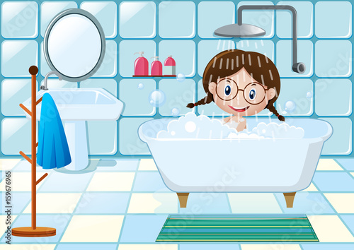 Little girl taking shower in bathroom