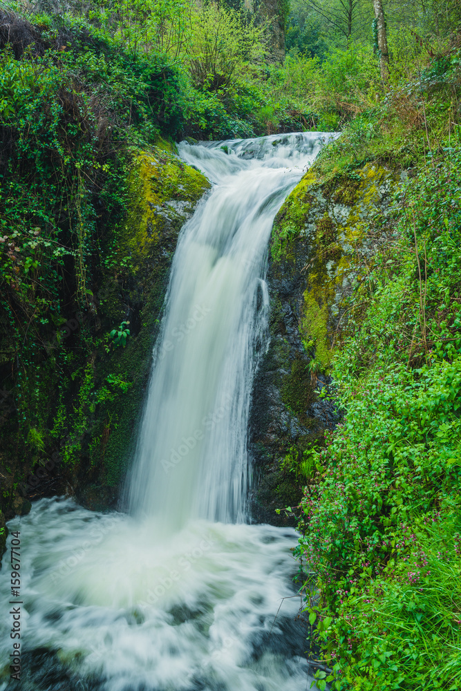 Waterfall in the Melo is a small traditional village in the foothills of Serra da Estrela. County of Guarda. Portugal