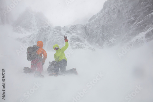 Climbers in extreme blizzard