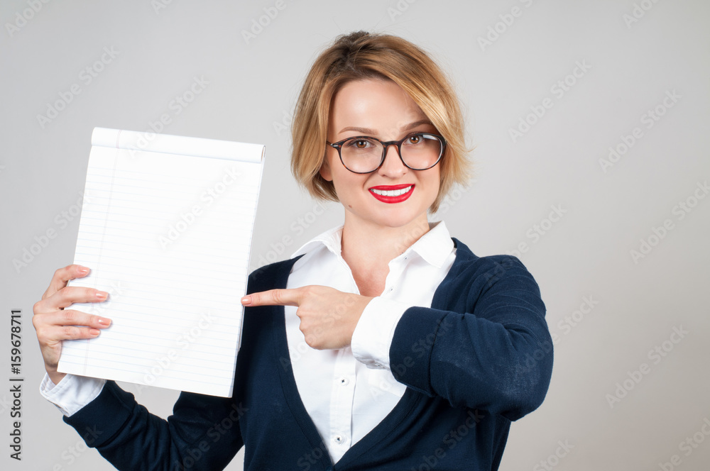 Young business woman holding empty white parer Young business woman holding empty white parer
