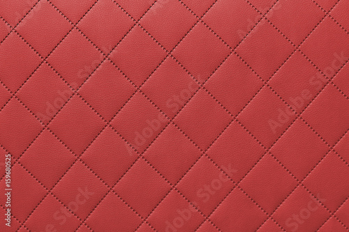 detail of red sewn leather, gray leather upholstery background pattern © Ivaylo