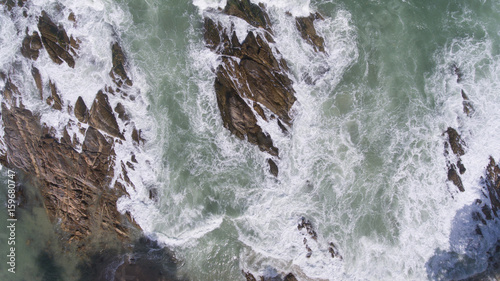Aerial view of ocean waves and fantastic Rocky coast