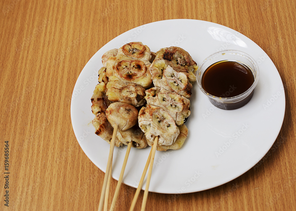 Delicious grilled banana with sweet taste sauce Delicious grilled banana with sweet taste sauce