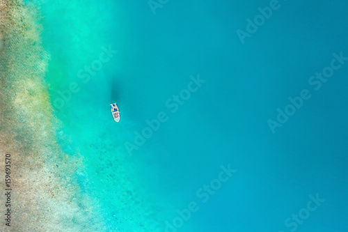Top view of a white boat in the sea