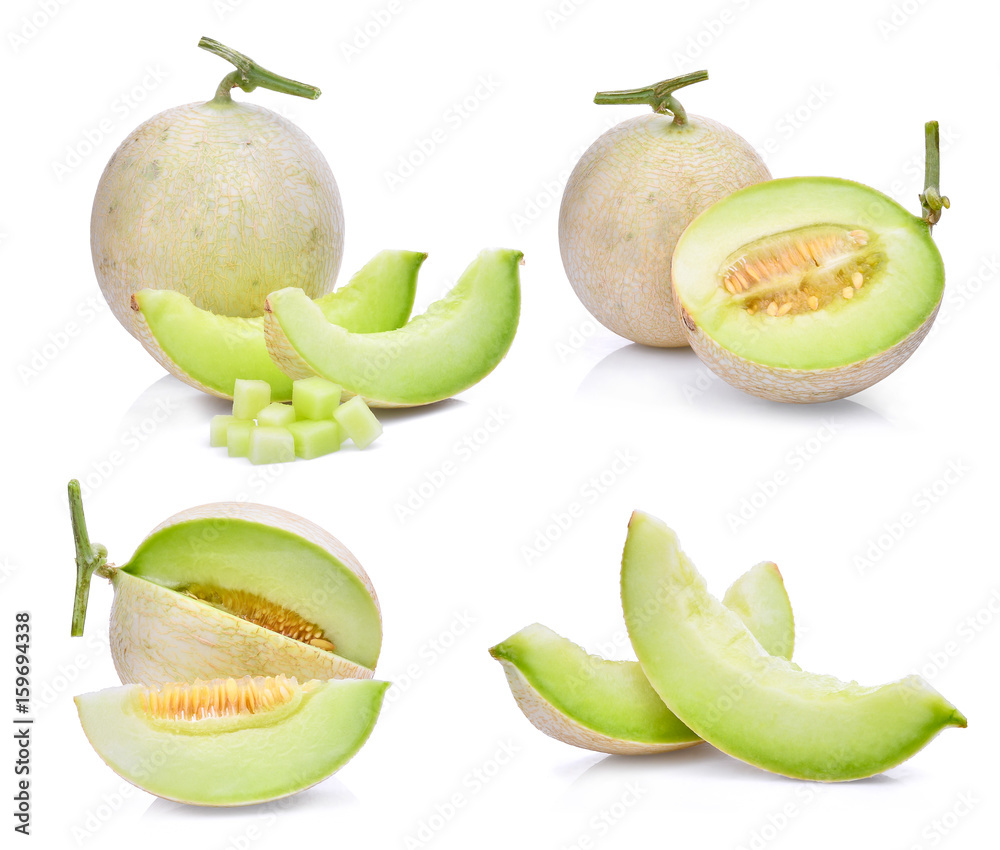 set of green cantaloupe melon with slice and cubes isolated on white background set of green cantaloupe melon with slice and cubes isolated on white background