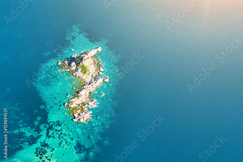 Top view of the island with green plants © watman