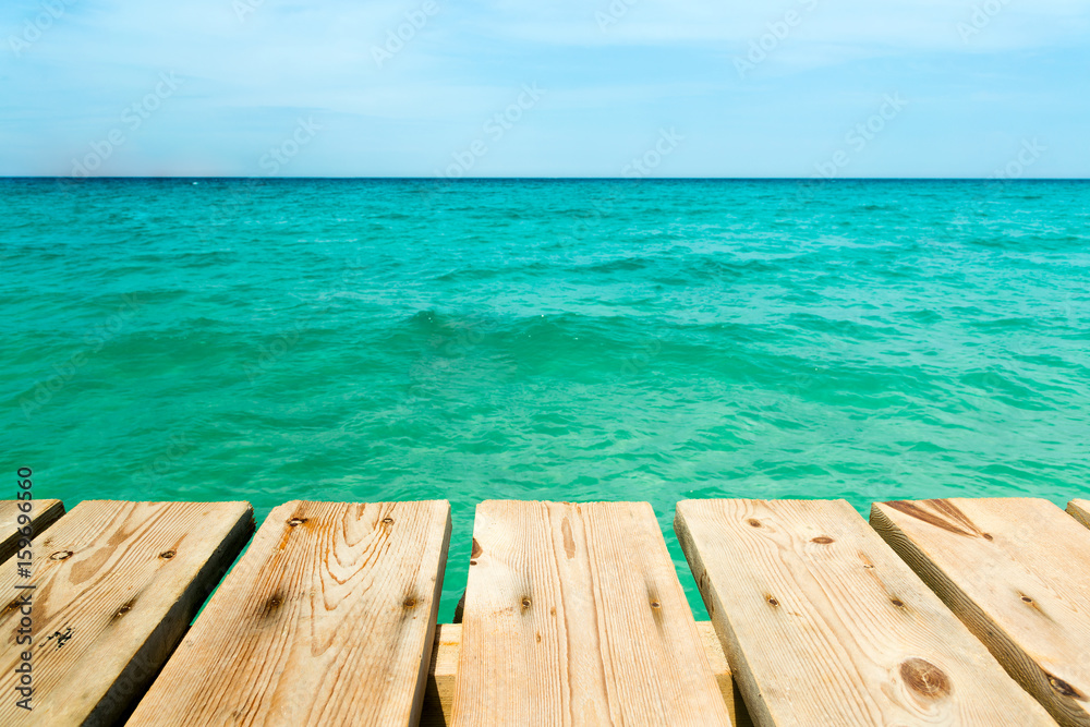 View from a wooden pier over the ocean View from a wooden pier over the ocean
