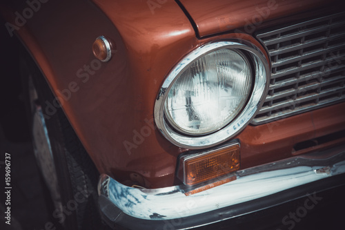 Canvas Print Headlights and body of an old classic car at an exhibition of vintage cars