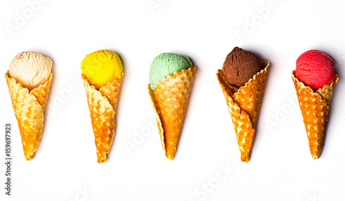 Various ice-cream scoops on white background