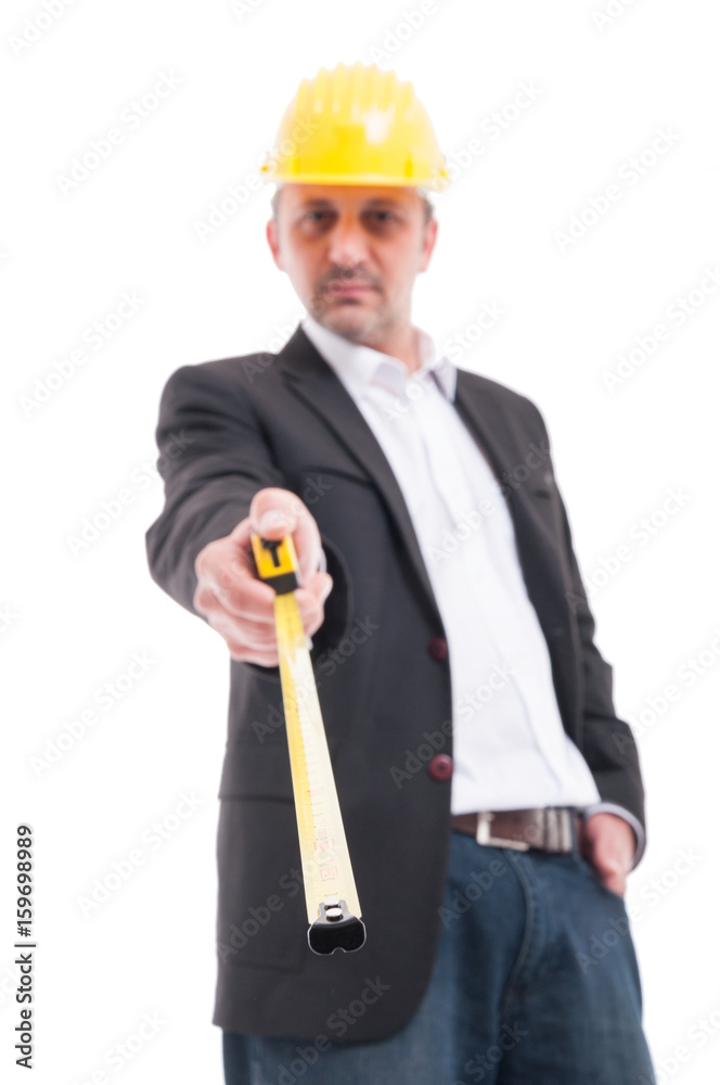 Selective focus of architect holding ruler tape Selective focus of architect holding ruler tape