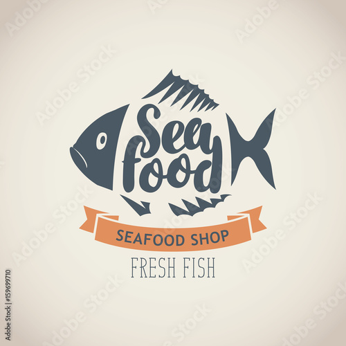 Vector emblem or banner for seafood shop with decorative fish, inscription seafood and words fresh fish on the beige background in retro style.
