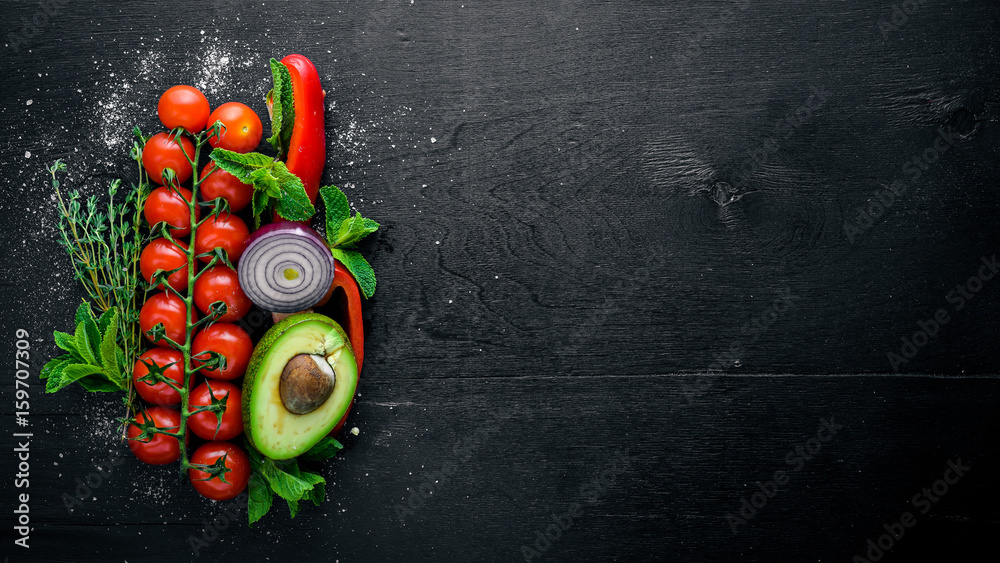 Plexiglas schilderij met Assorted vegetables and cherry tomatoes on Wooden background. Top view. Free space. #159707309