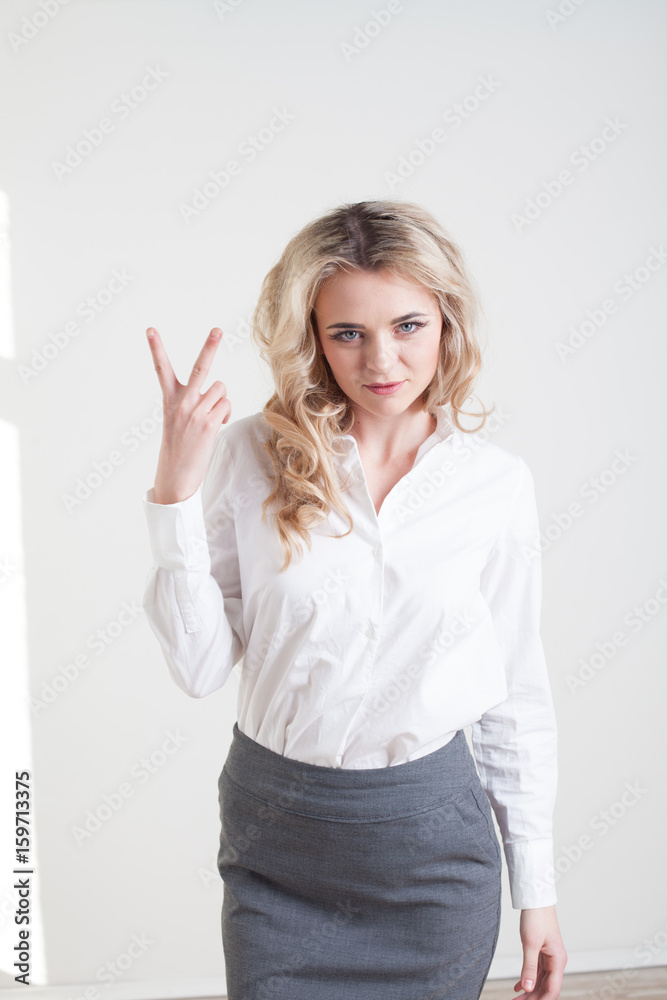 girl in a business suit shows characters hands girl in a business suit shows characters hands