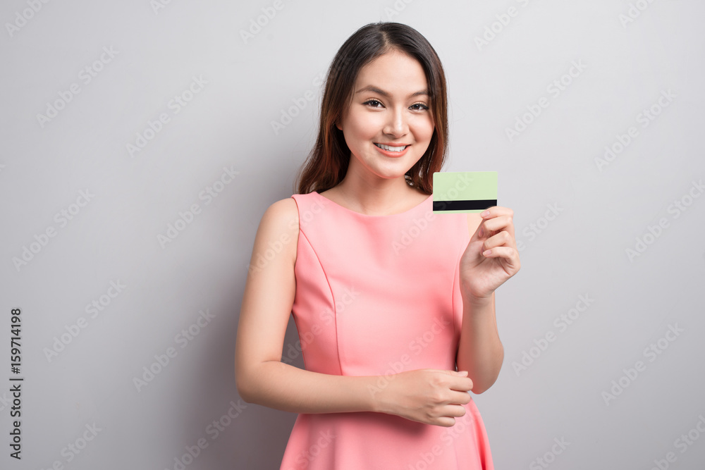 Charming asian woman hand show credit card. Presenting your product. Charming asian woman hand show credit card. Presenting your product.