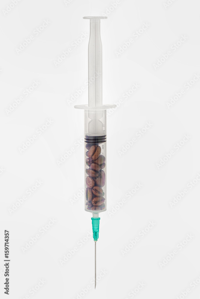 Coffee beans in syringe Coffee beans in syringe