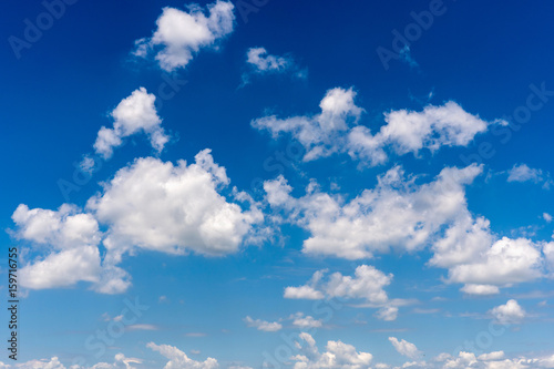 Fototapeta Naklejka Na Ścianę i Meble -  Sunny day with fluffy clouds in the blue sky