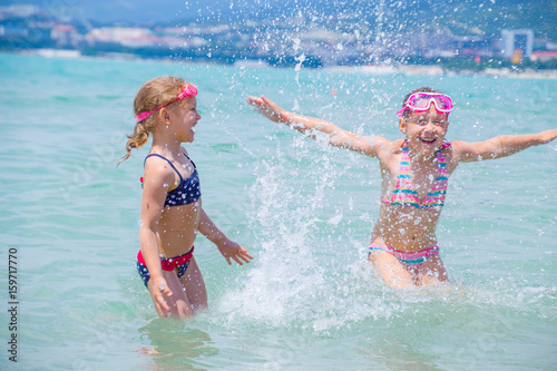 little girls on sea resort