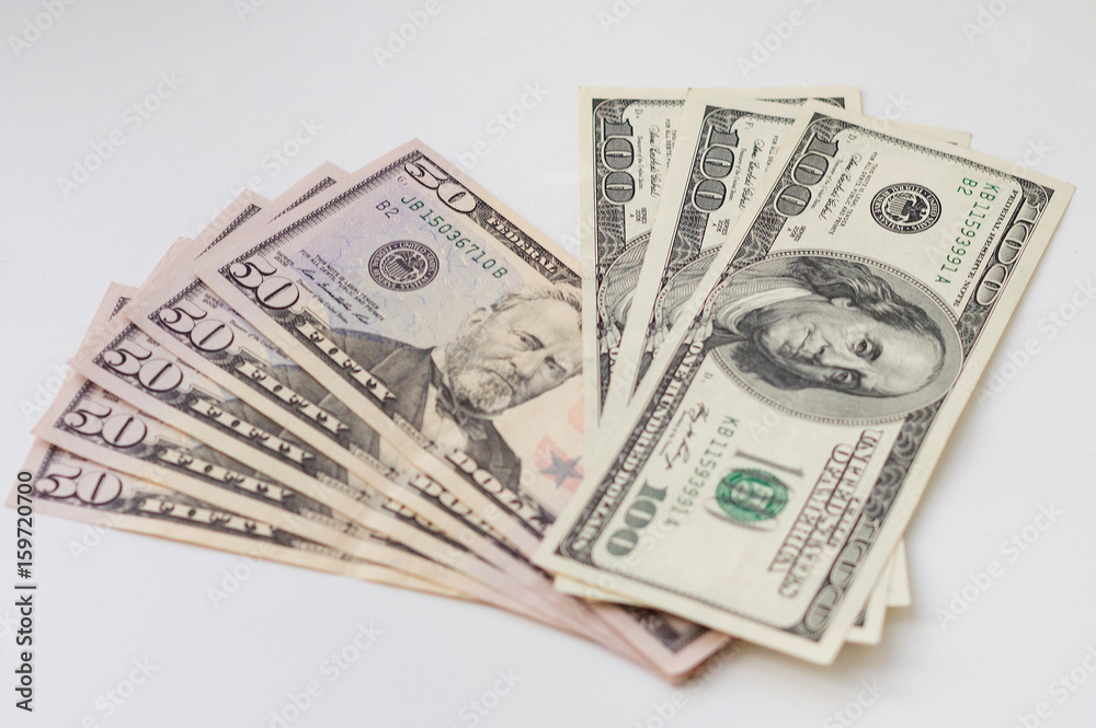 Close up view of pile of dollars Close up view of pile of dollars