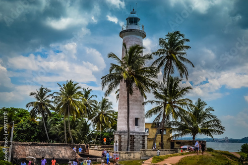 White Lighthouse on the shore in Galle Sri Lanka © poplers