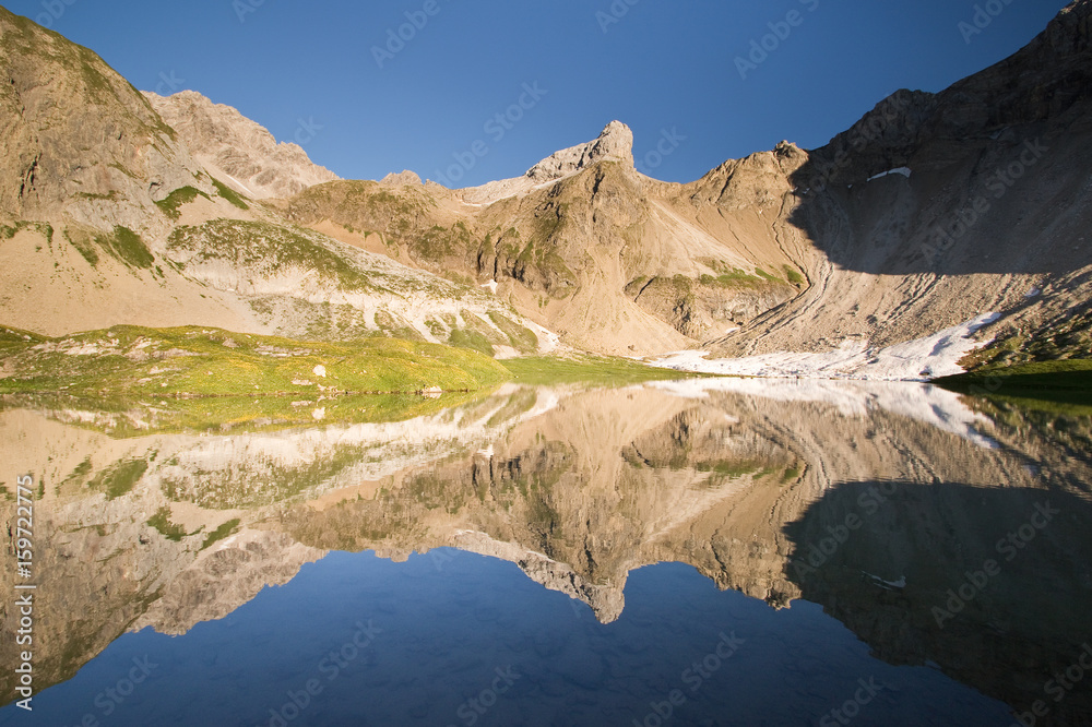 Reflections in Alpine lake