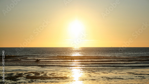 lacanau ocean france beach with surfers photo