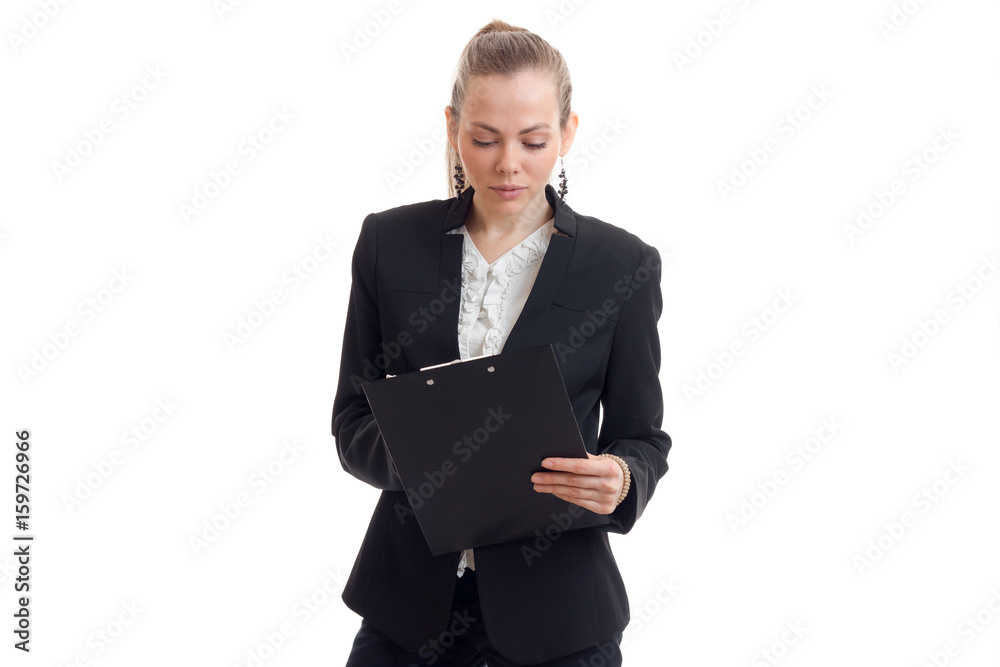young blonde business woman make notes in tablet young blonde business woman make notes in tablet