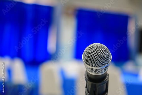 microphone in a meeting room seminar conference background: Select focus with shallow depth of field.