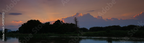 panorama sunset in sky beautiful colorful landscape silhouette tree woodland and river reflect the twilight time