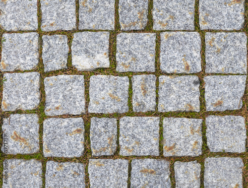 Texture of cobblestone road close-up.