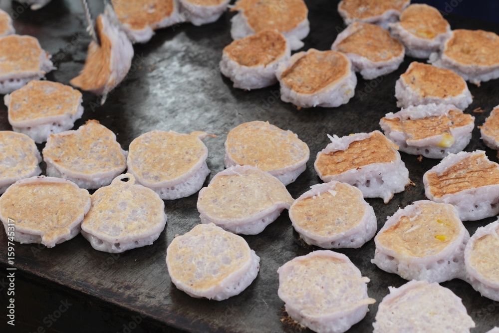 flour mix coconut and then fried ,Thai dessert. flour mix coconut and then fried ,Thai dessert.