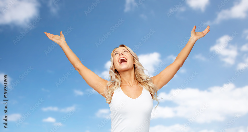 happy woman celebrating victory over blue sky happy woman celebrating victory over blue sky