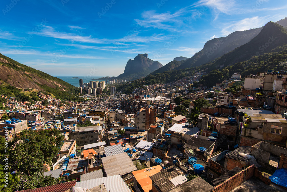 Rocinha is the Largest Favela in Brazil and Has Over 70,000 Inhabitants and is Located in Rio de Janeiro City Rocinha is the Largest Favela in Brazil and Has Over 70,000 Inhabitants and is Located in Rio de Janeiro City