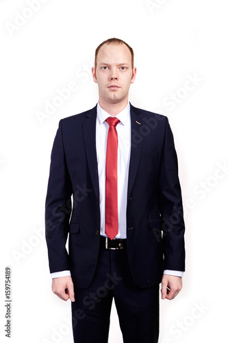 Respectable senior businessman, wearing black suit, white shirt and red tie  standing on white background Stock Photo | Adobe Stock