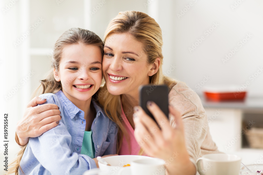 happy family taking selfie by smartphone at home happy family taking selfie by smartphone at home