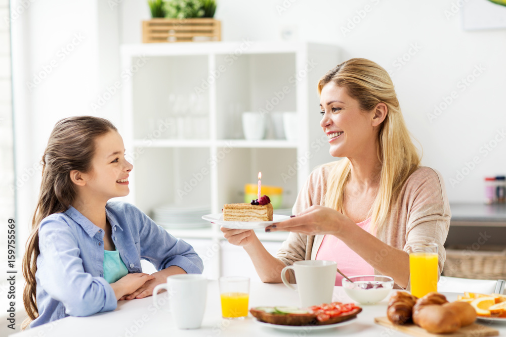 happy family with birthday cake at home kitchen happy family with birthday cake at home kitchen