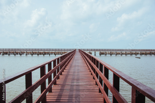 Wood bridge and seascape. Film Filter