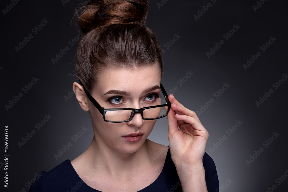 Portrait of a beautiful woman in a business style. Portrait of a beautiful woman in a business style.