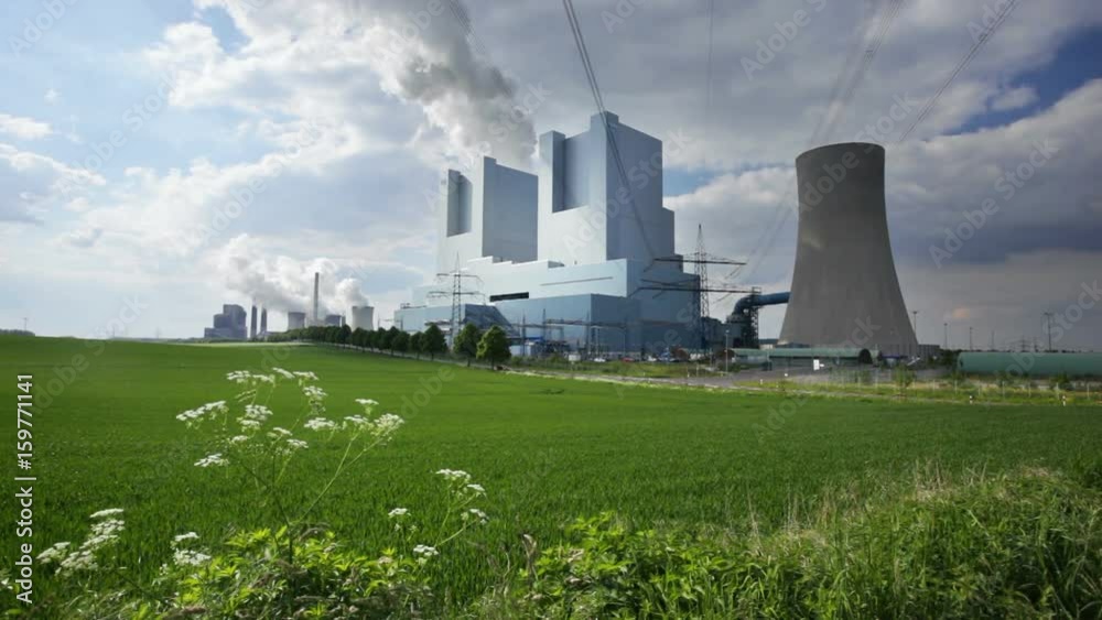 Two coal-fired power stations in green agricultural landscape in Germany
Two coal-fired power stations in green agricultural landscape in Germany