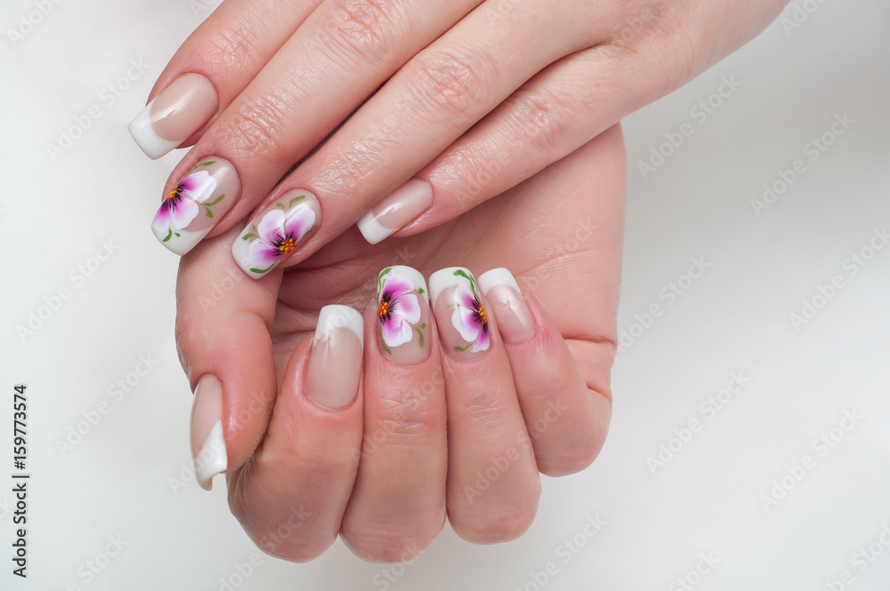 Wedding French manicure with Chinese painting on long square nails.
Wedding French manicure with Chinese painting on long square nails.