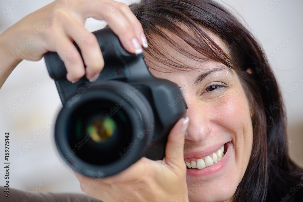 happy photographer with camera