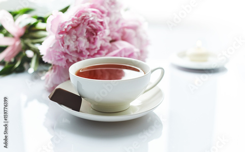 flowers and tea on table