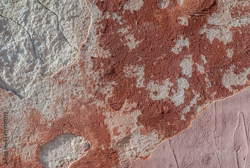 concrete wall with old plaster chipped, texture background