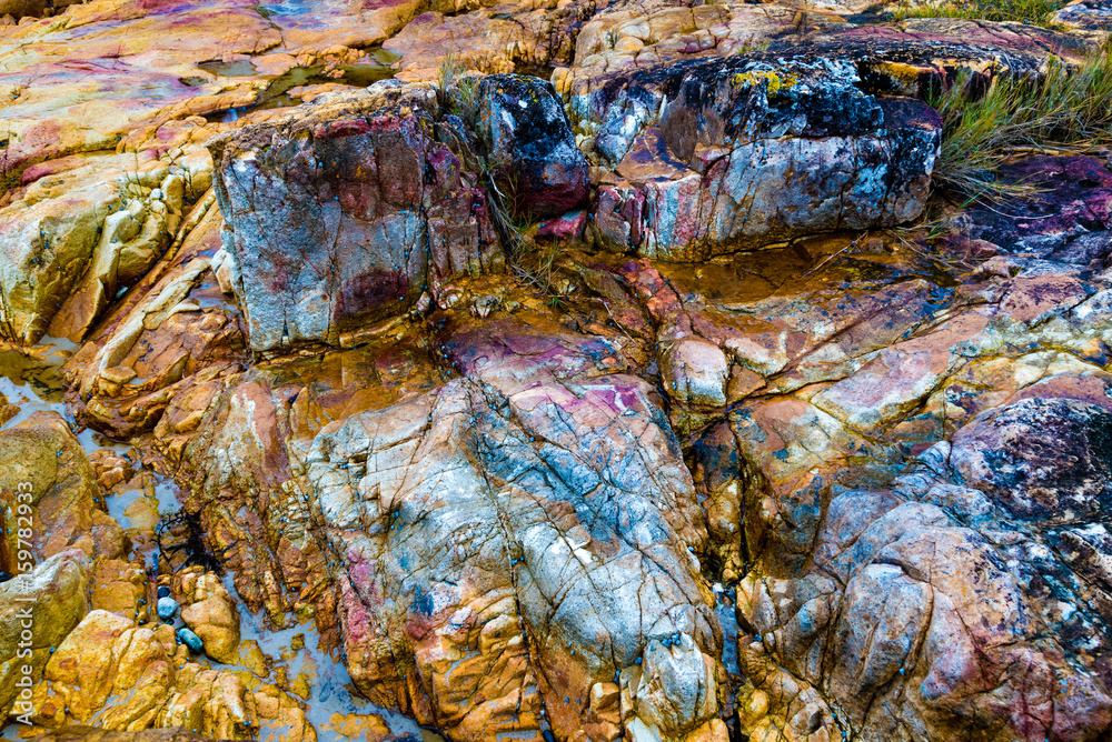 Colourful rocks at Diamond Head coast, Australia