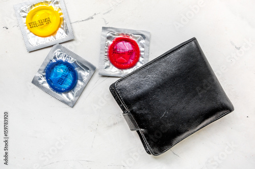 male contraception for safe sex with condoms on white background top view